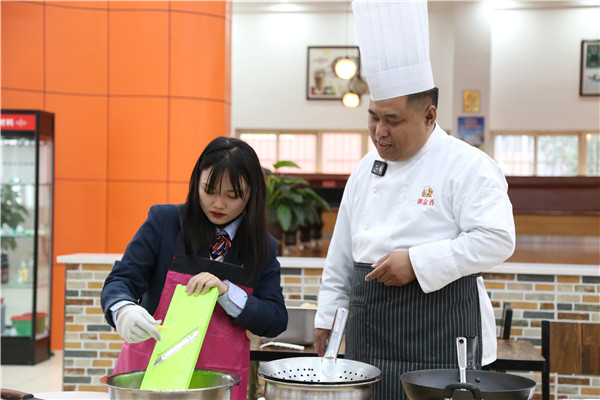 ʯ���f���A��X�WУ